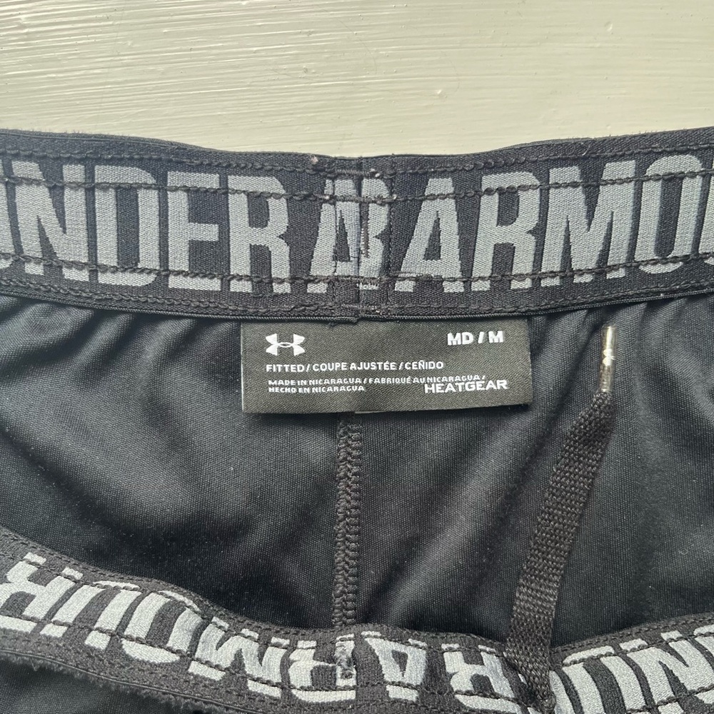 Under Armour black athletic shorts, size medium
